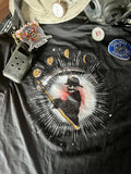 Black T-Shirt from Squad 9s Notorious Collection featuring a mystical plague doctor design