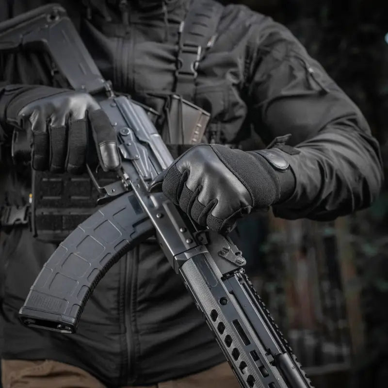 Black tactical AK-style rifle with M-Tac Gloves Police Gen.2 for optimal control