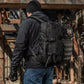 Black M-Tac Assault Pack featuring MOLLE webbing and large main zippered compartments