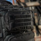 Black M-Tac Assault Pack with MOLLE webbing and two large main zippered compartments