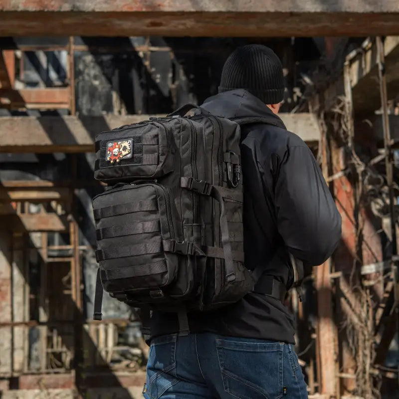 Black M-Tac Assault Pack with MOLLE webbing and two large main zippered compartments