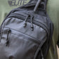 Black tactical backpack with zippered compartments in the BLINDSIDE - Concealed Carry Sling