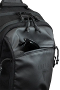 Black tactical backpack with zippered compartments in the BLINDSIDE - Concealed Carry Sling