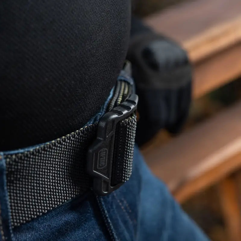 Black tactical belt buckle with textured nylon webbing on M-Tac Double Sided Lite Tactical Belt