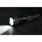 Black Warrior LT-G5 long throw tactical flashlight illuminating water droplets