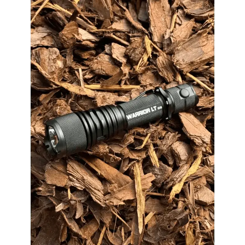 Black Warrior LT Gen 5 Long Throw Tactical Flashlight with textured grip and holster