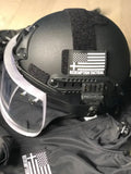 Black tactical helmet with face shield for Body Armor by Redemption Tactical