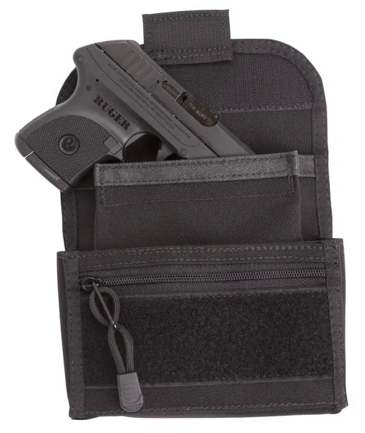 Black tactical holster with handgun and storage pocket for concealed carry pouch