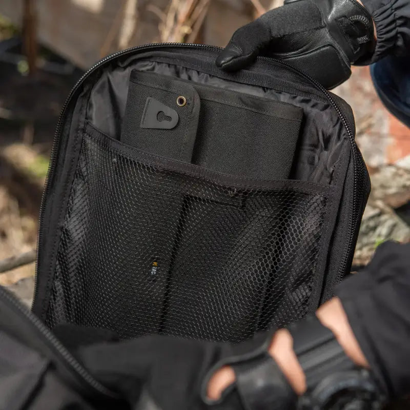 Black tactical pouch with mesh pocket for M-Tac Assault Pack’s large main zippered compartments