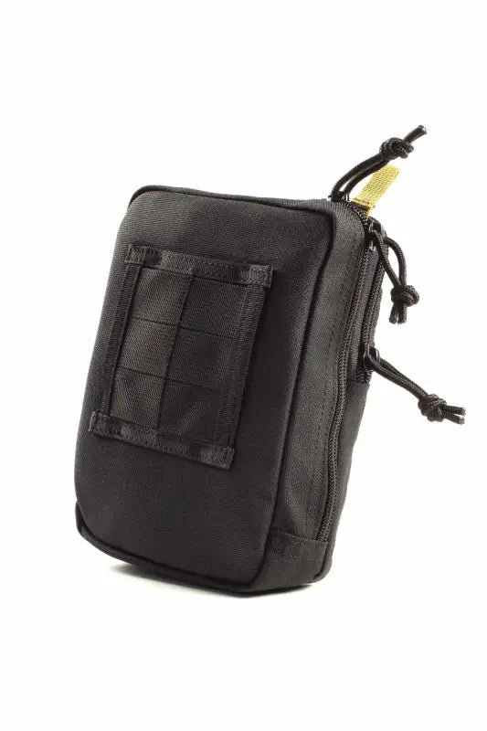 Black tactical utility pouch with MOLLE webbing for Liberty Gun Pack and concealed carry