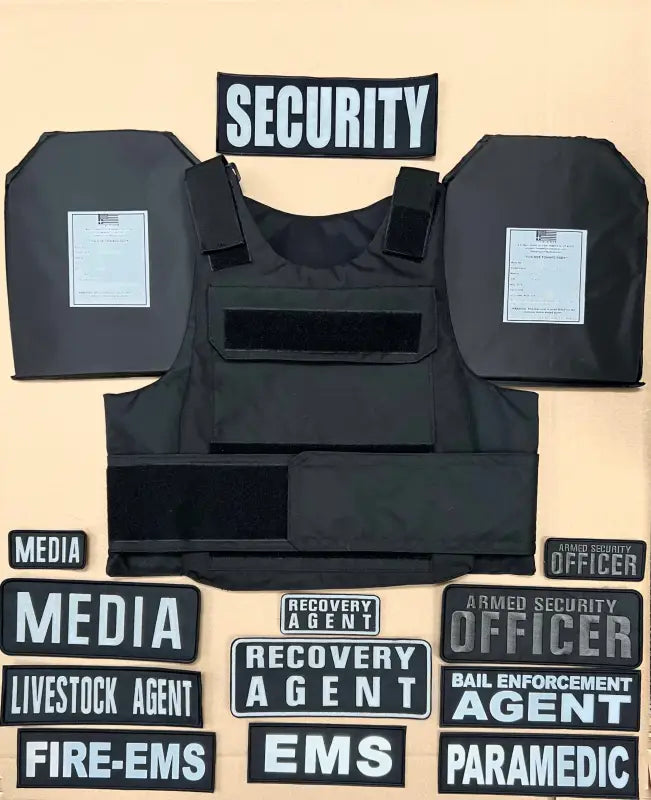 Black tactical vest with patches featuring level IIIA body armor by Redemption Tactical