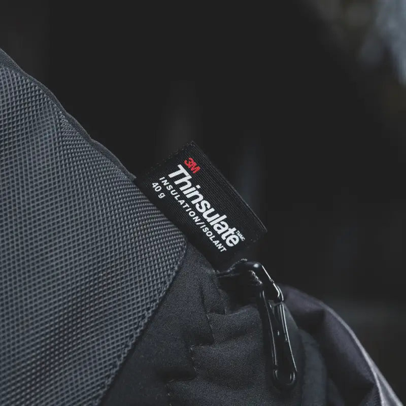 Black Thinsulate label on M-Tac Gloves Soft Shell Thinsulate showcasing quality and warmth