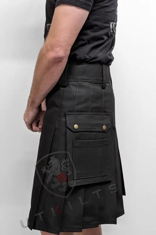 Black utility kilt with cargo pockets and pleats from the Standard Utility Kilt collection