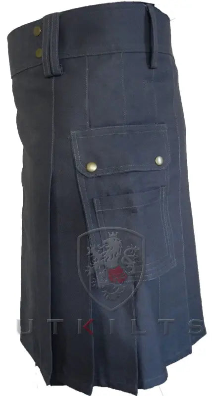 Black utility kilt with cargo pockets and embroidered shield emblem in dark gray