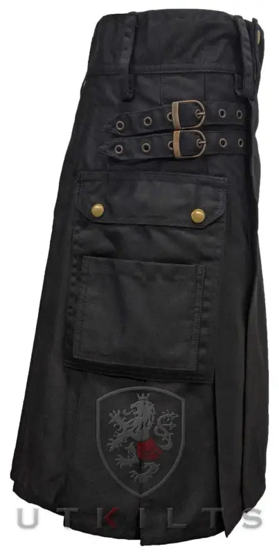 Black utility kilt with cargo pockets and buckle straps for men, featuring an embroidered shield