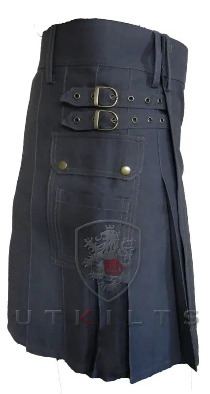 Black utility kilt with decorative shield emblem and buckle straps for Standard Dark Gray Utility Kilt