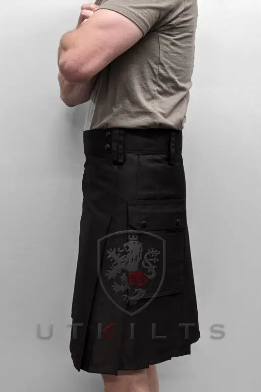 Blackout Utility Kilt featuring a shield emblem with a red star design