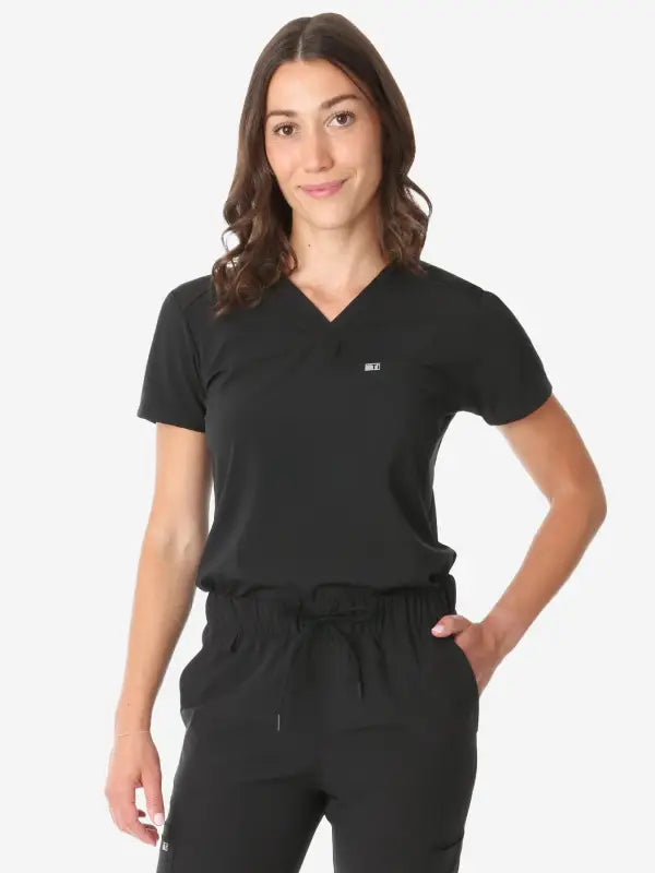 Black V-neck scrub top with short sleeves from Women’s Tuckable One-Pocket Scrub collection