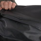 Black waterproof fabric being held for the SUMMIT Discreet Rifle Backpack