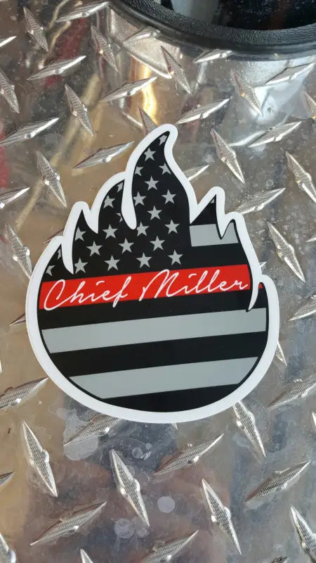 Black and white Chief Miller decal sticker in flame shape with red text design