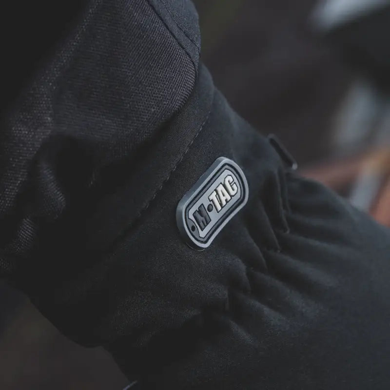 Black winter glove featuring M-TAC logo patch on M-Tac Gloves Soft Shell Thinsulate