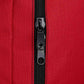 Black zipper detail on red fabric of Firefighter Helmet and Turnout Gear Bag