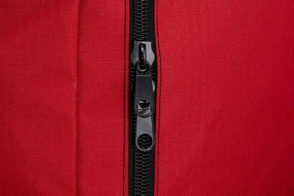 Black zipper detail on red fabric of Firefighter Helmet and Turnout Gear Bag