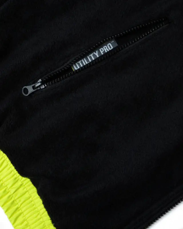 Black zipper with Utility Pro text and neon yellow trim on UHV1001 HiVis zip reversible insulated vest