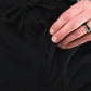Black zippered pocket pants with carrier retention waistband, ideal for Traveler Joggers and concealed carry