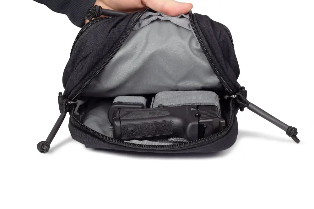 Black zippered waist pack with compartments for the Avenger Concealment Gun Pack