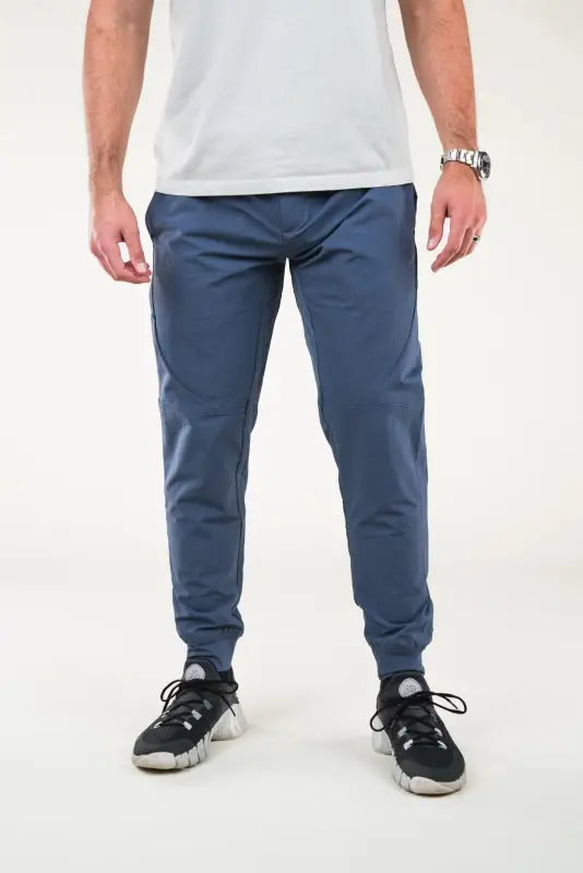 Blue athletic pants from Carrier Traveler Joggers featuring a concealed carry waistband