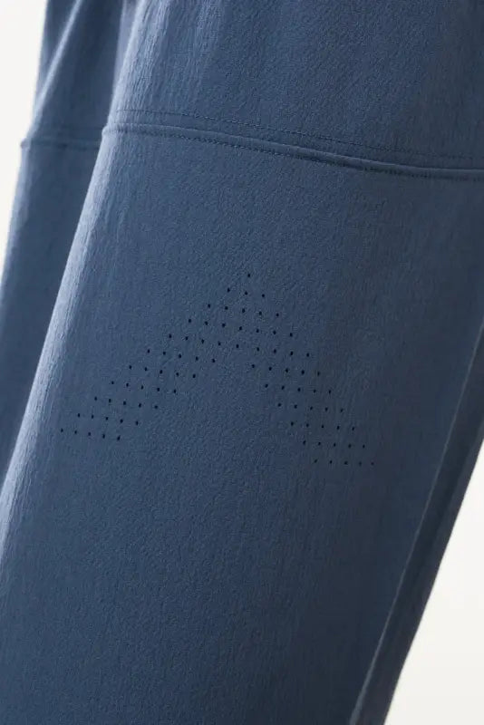 Blue fabric with perforated design for Carrier Traveler Joggers - Steel Blue with concealed carry