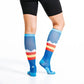 Blue knee-high athletic socks with red and yellow stripes for Colorado Peaks first responders