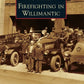 Book cover of Firefighting in Willimantic featuring vintage firefighters and fire truck