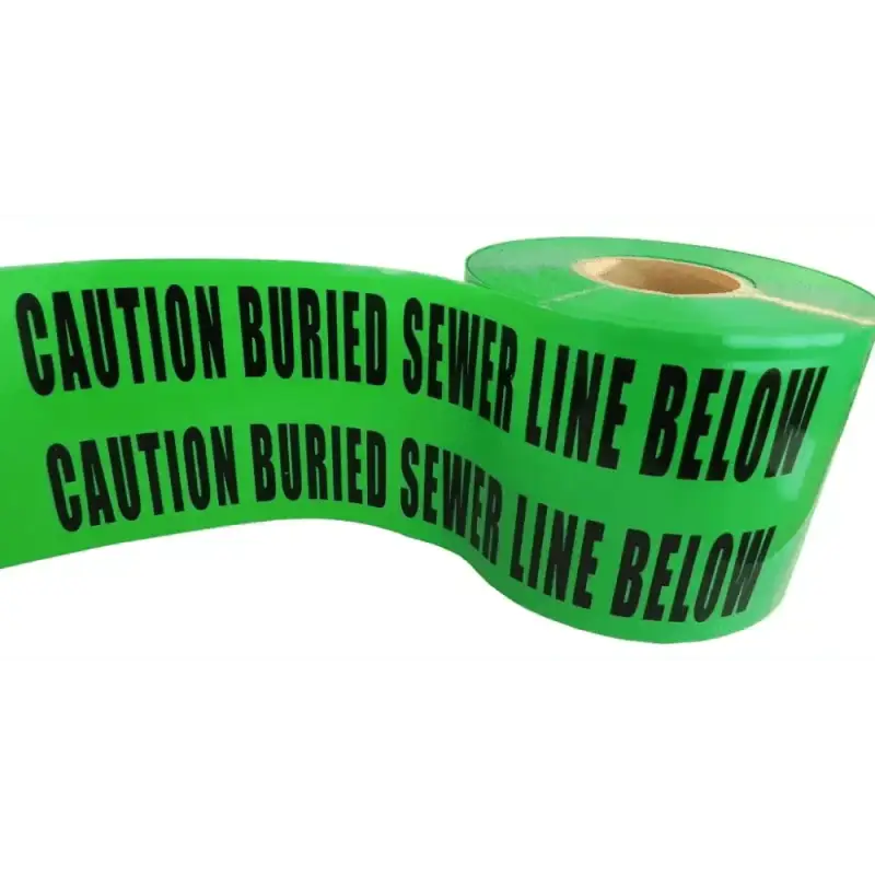 Bright green Barricade Flagging Tape cautioning buried sewer line in hazardous areas