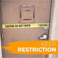 Brown door with caution tape and KEEP RESTRICTION sign for buried sewer line safety