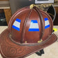 Brown leather firefighter helmet with blue grey triple stripe reflective bands