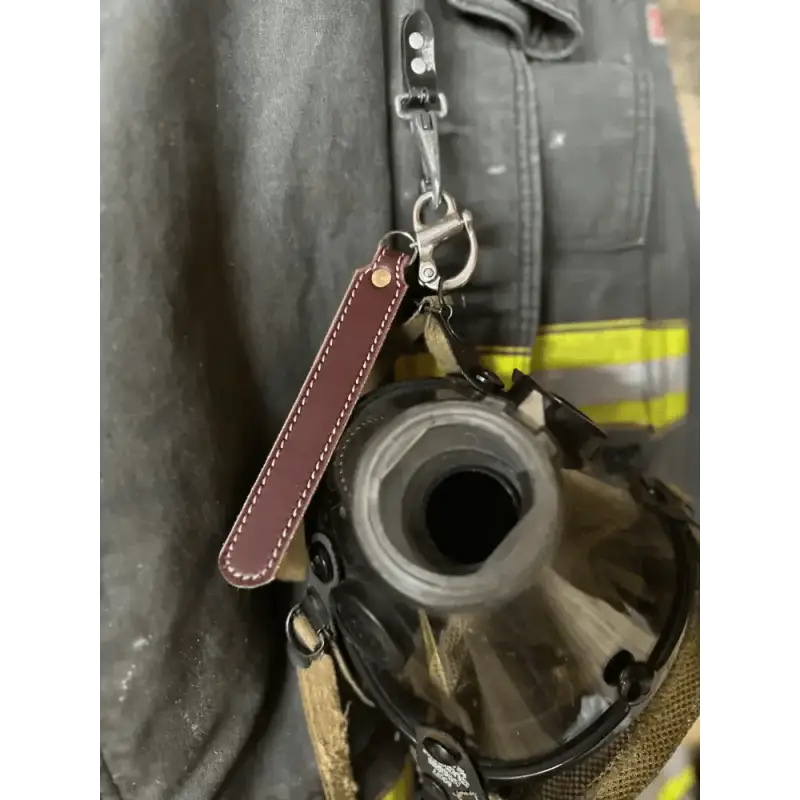 Brown leather strap with metal clip for SCBA Quick Release functionality