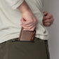Brown leather wallet with concealed carry design in Carrier Traveler Joggers featuring carrier retention waistband