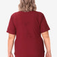 Burgundy women’s stash-pocket scrub top viewed from the back for comfort and style