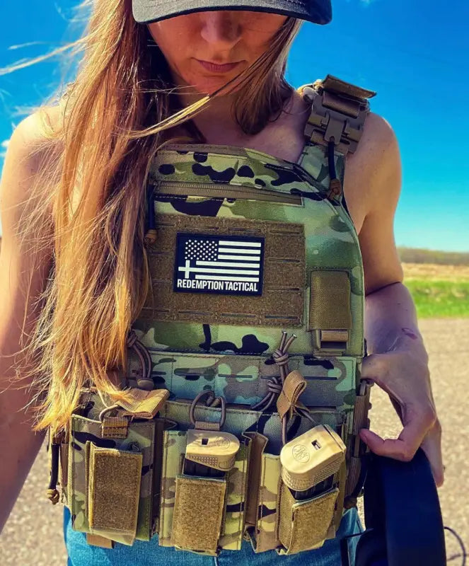 Camo-patterned tactical vest with pouches and flag patch, lightweight Level IV body armor