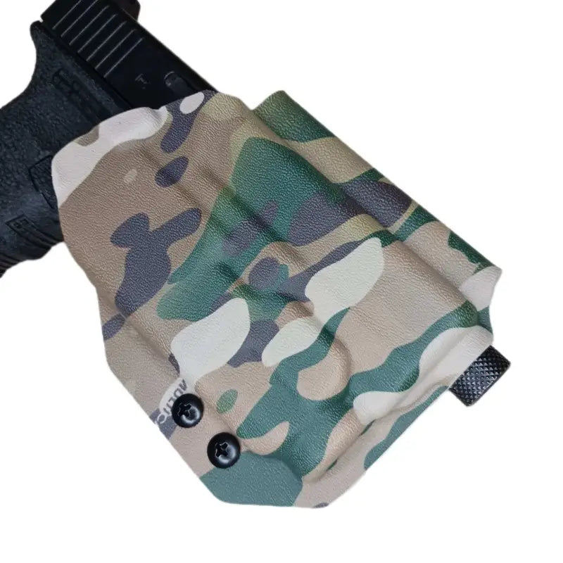 Camouflage-patterned multimount holster TLR-7 with black fasteners and G-Code paddle