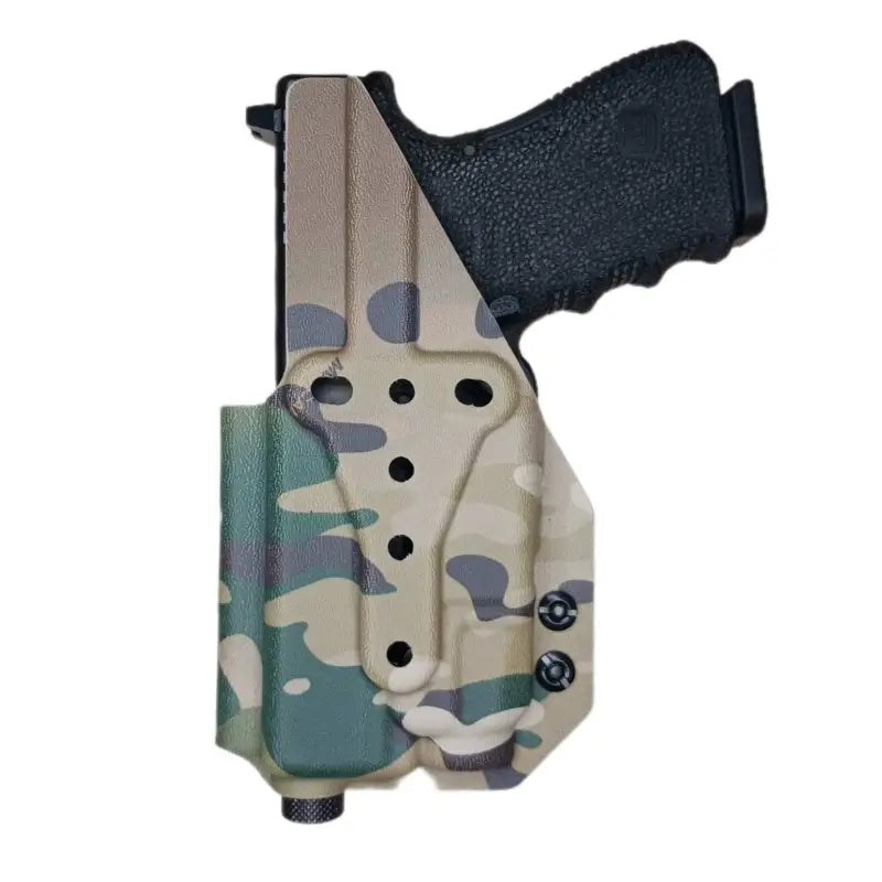 Camouflage-patterned Multimount Holster TLR-7 with black handgun and G-Code paddle