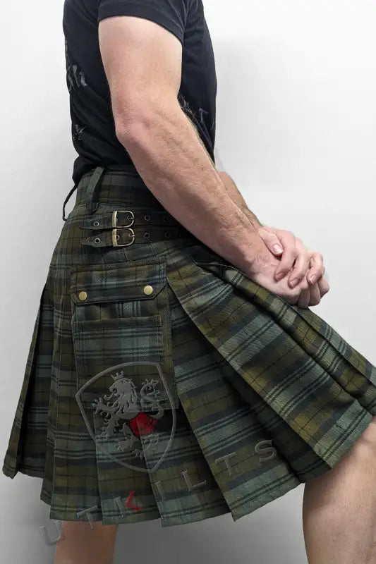 Camouflage-patterned pleated kilt with buckle straps in Black Watch Weathered design