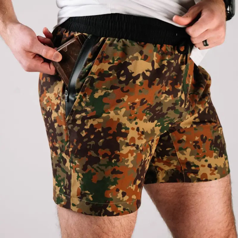 Camouflage carrier training shorts with 5-inch inseam for concealed carry and training