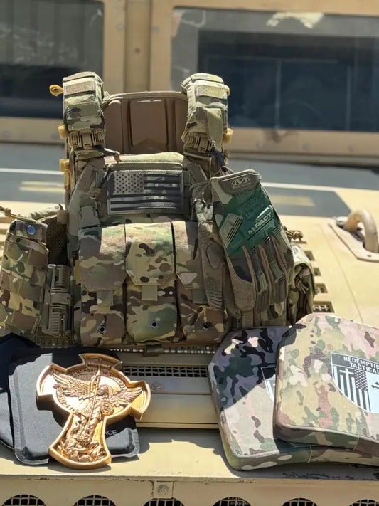 Camouflage tactical vest with American flag patch, part of Redemption Tactical Level IIIA body armor kit