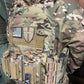 Camouflage tactical vest plate carrier by Redemption Tactical with pouches and patches