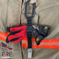 SMC Black Oval Carabiner with free glove strap attached to firefighting gear