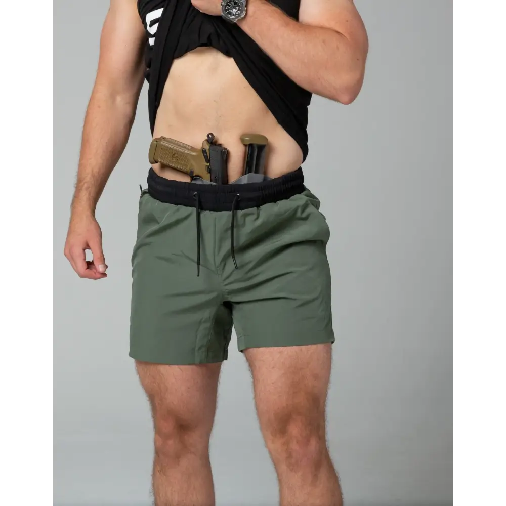 Olive green Carrier Training Shorts with concealed carry holster for Arrowhead Tactical Apparel