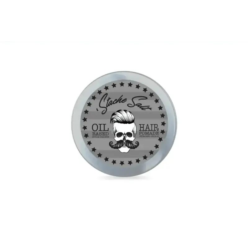 Circular container of Pursuit Hair Pomade with skull logo and stars, shiny strong hold